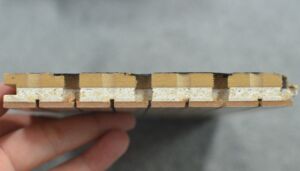 Acoustic wooden 3-layer panel with the groove